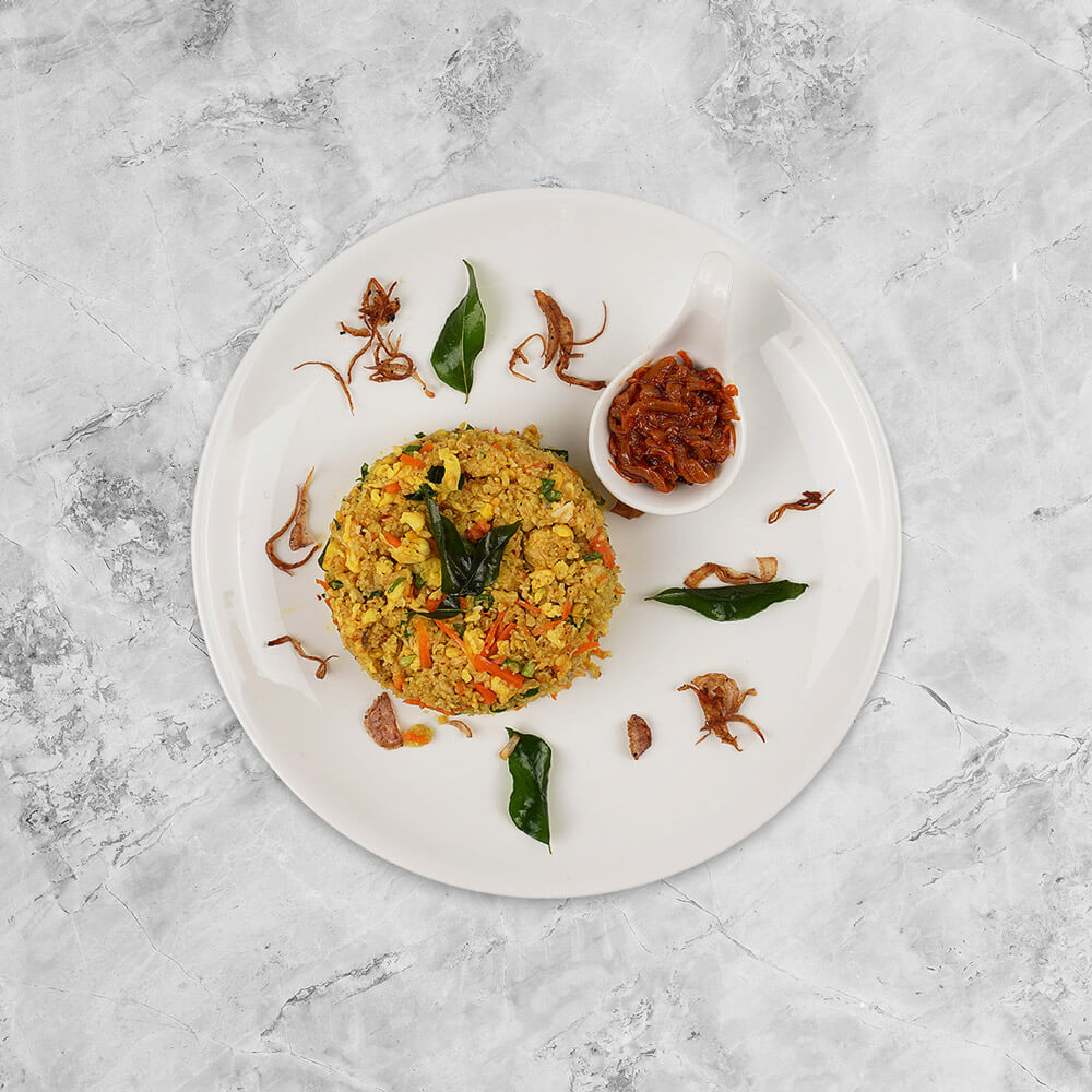 Light & fluffy steamed string hoppers, made from rice flour. Shredded, chopped and tossed Colombo street style with egg.