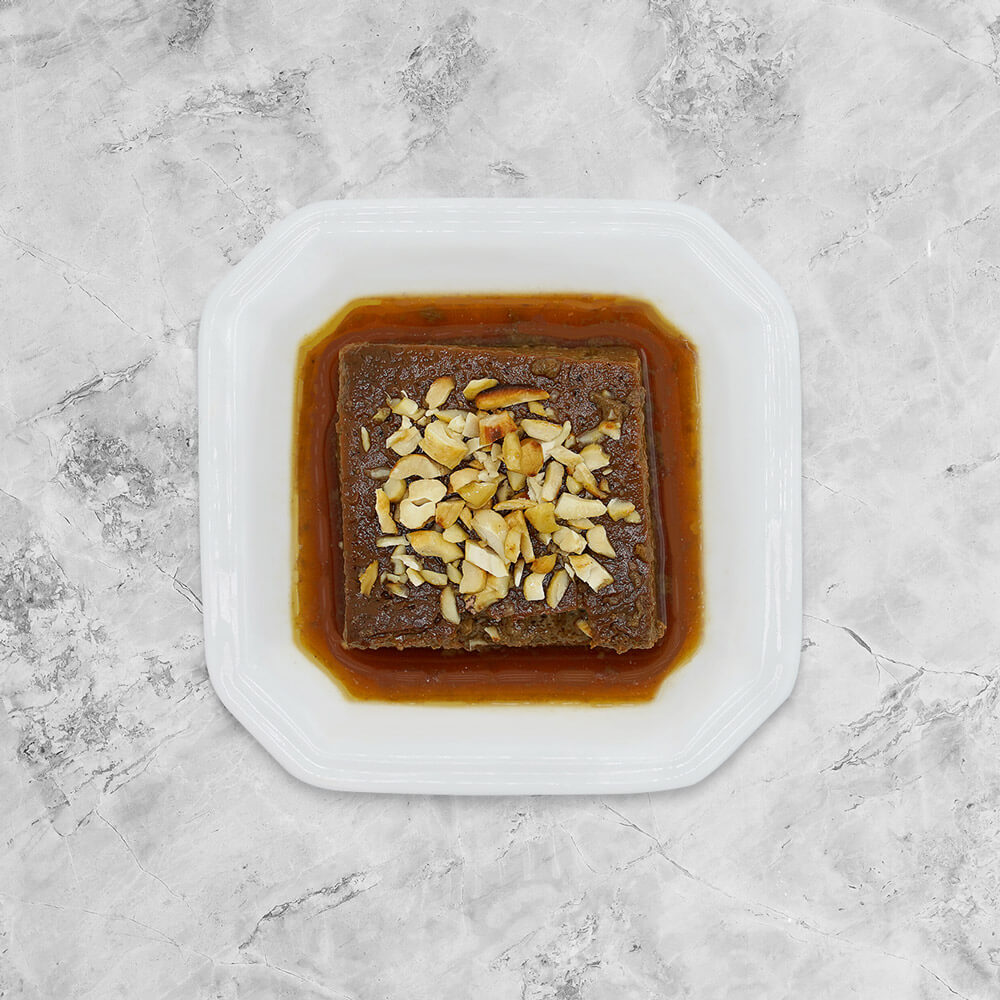 Tantalising Sri Lankan pudding-like dessert with a brown sugar base, served with a heavenly cardamom, cinnamon and ginger sweet syrup.